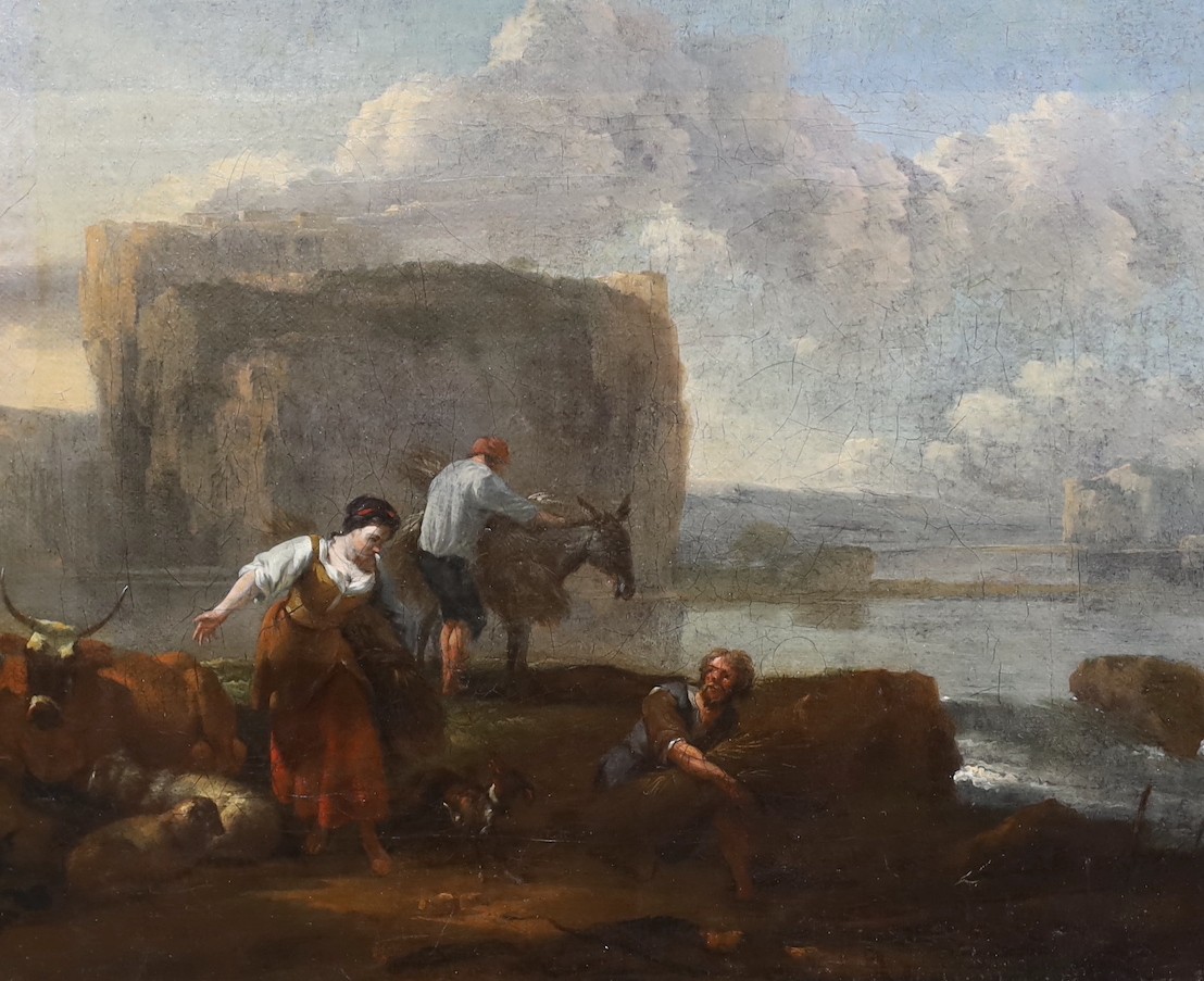 Nicholaes Bercham (Dutch, 1620-1683), A landscape with figures and animals on the shores of a lake, a mountainous cliff with buildings beyond, oil on canvas, 30 x 37cm